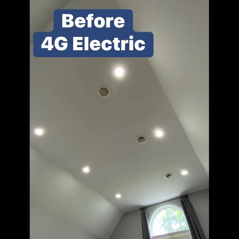 Recessed high-hat lighting across a vaulted ceiling