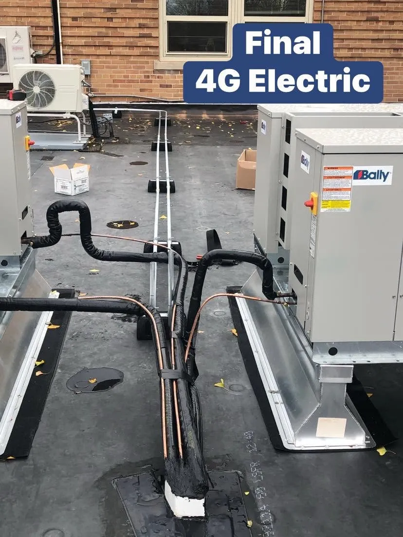 Rooftop refrigeration and HVAC condensing units wired on a commercial building